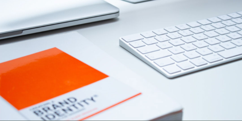 Brand Identity Book on Minimalist Desk.png